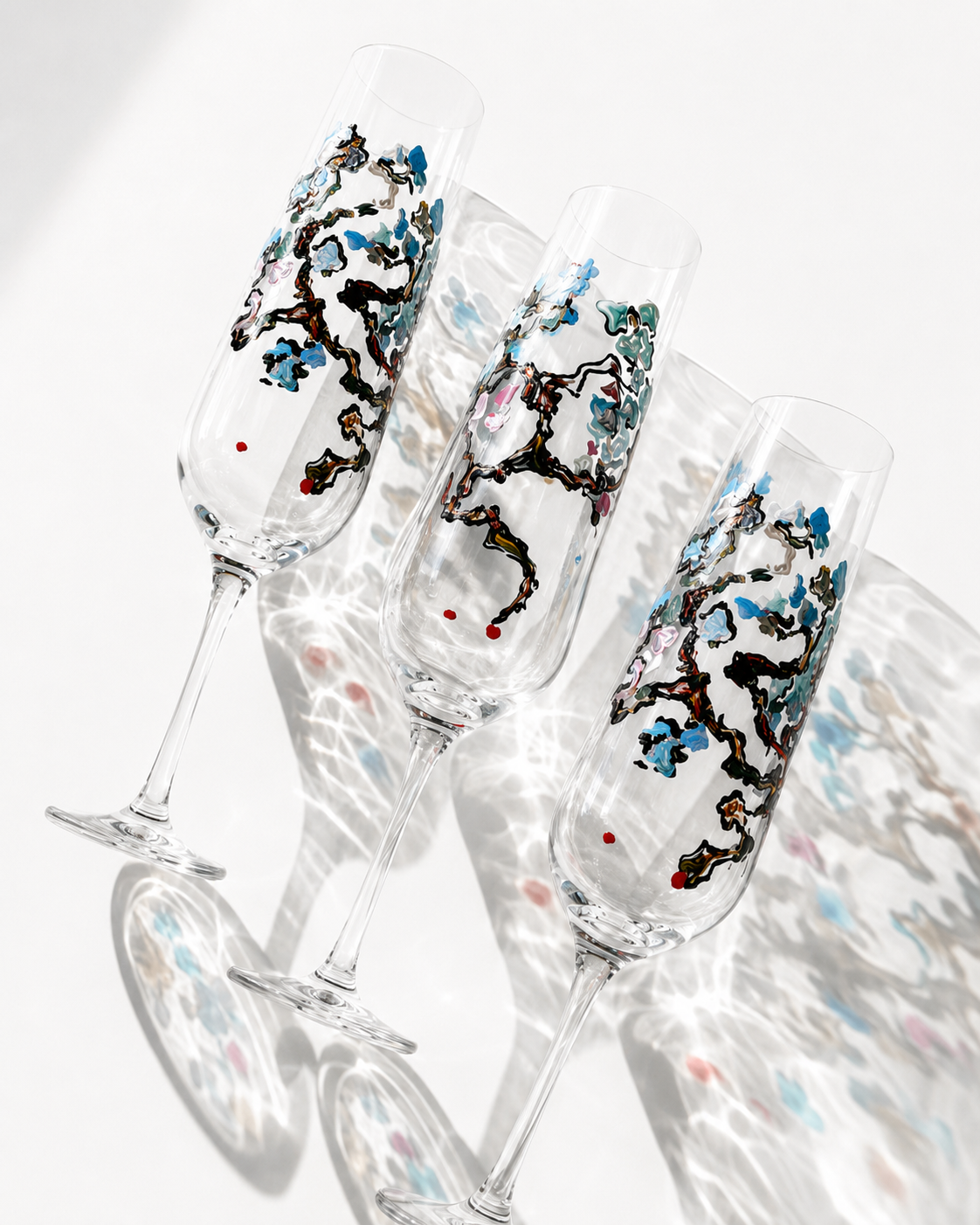 An intimate wedding table set with Passionflowwer painted blossom glasses